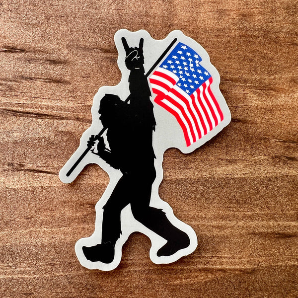 Bigfoot Carrying Flag Sticker